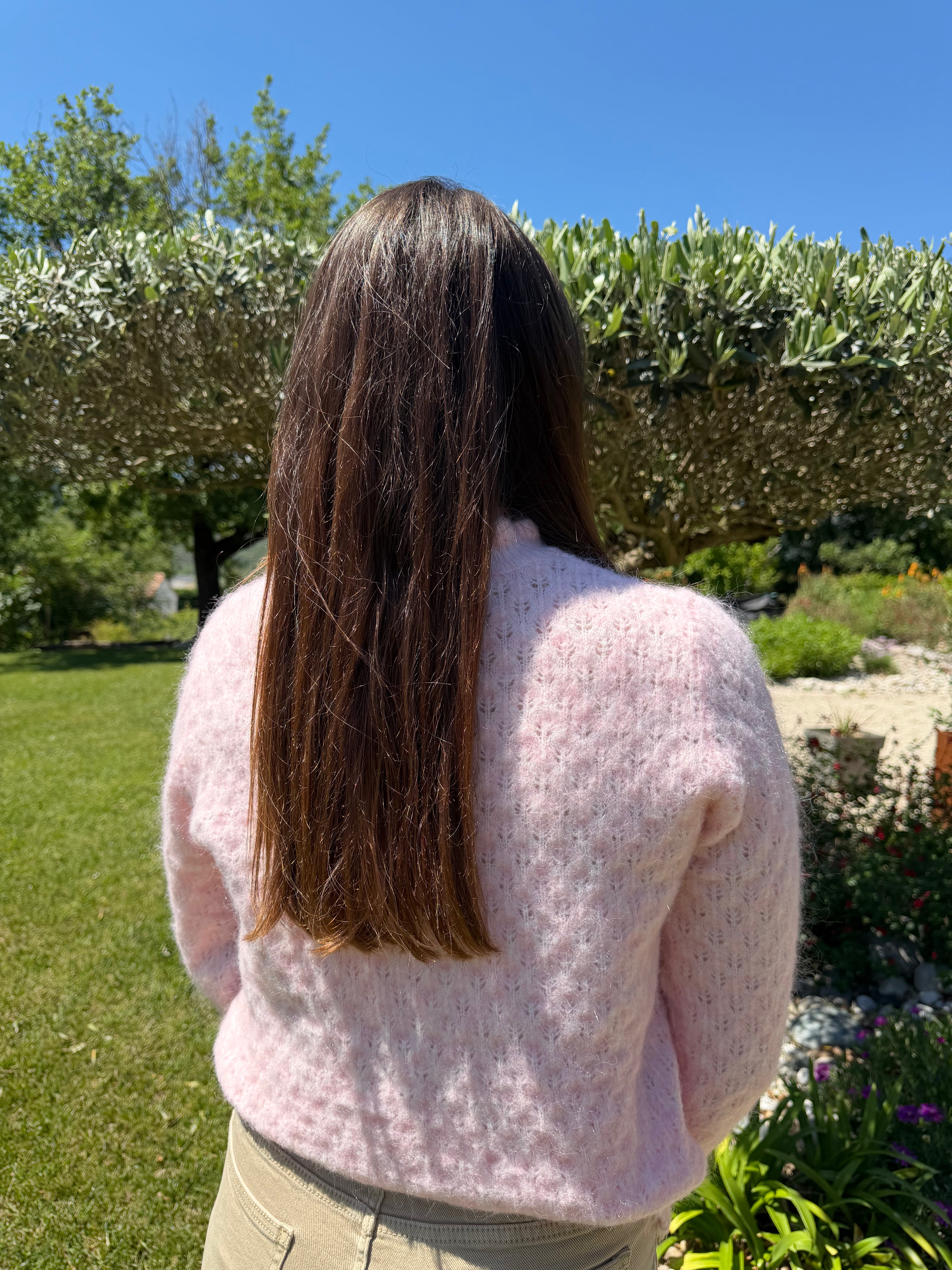 gilet rose pale col et poignet festonnés pour un style chic et élégant pour femme