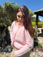 gilet rose pale col et poignet festonnés pour un style chic et élégant pour femme