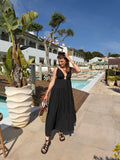 robe longue solène noir avec bijou soleil sur poitrine style chic pour femme