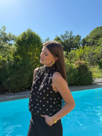 blouse noir à pois blanc sans manche style chic et élégant pour femme 